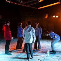 The cast warming up